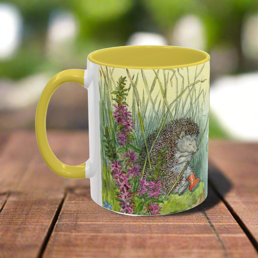 Mug with a hedgehog and floral design on a white background