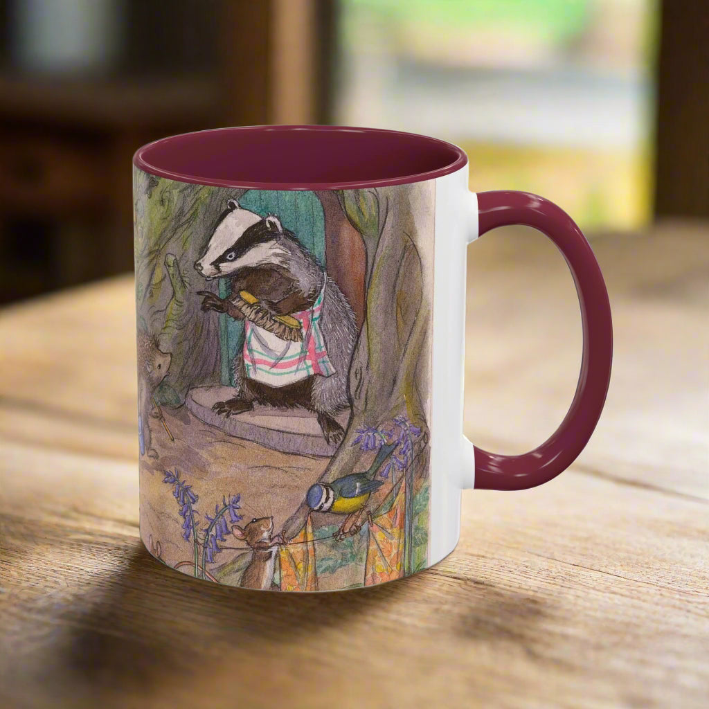 Mug with a badger illustration spring cleaning in a woodland with other animals, with a maroon red inner and handle