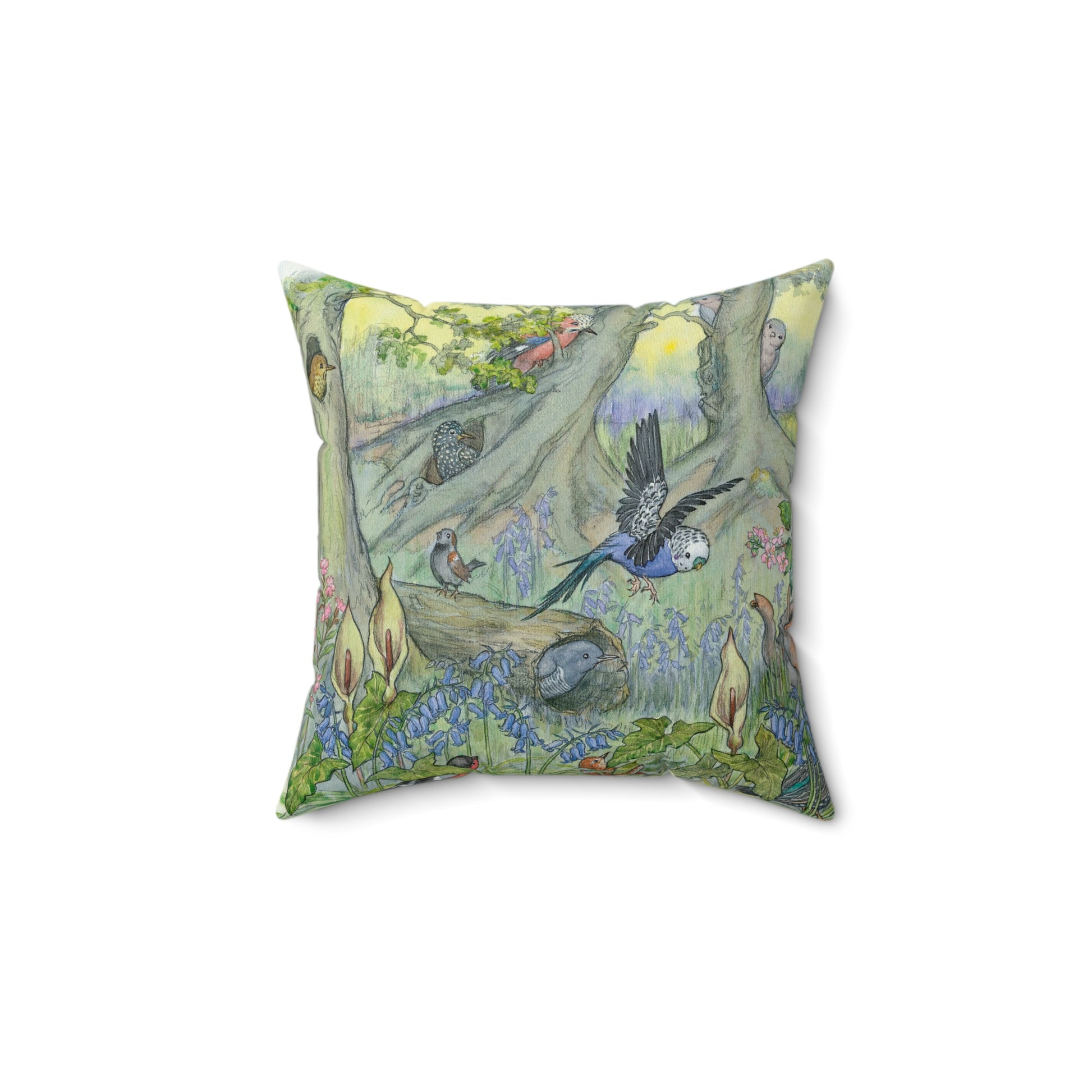 Decorative pillow with nature-themed design featuring birds and trees on a white background