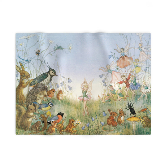 Fleece blanket with fairy and animal design on a white background